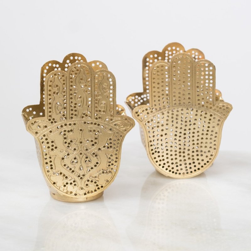 Goudkleurige waxine licht houders met filligrain patroon