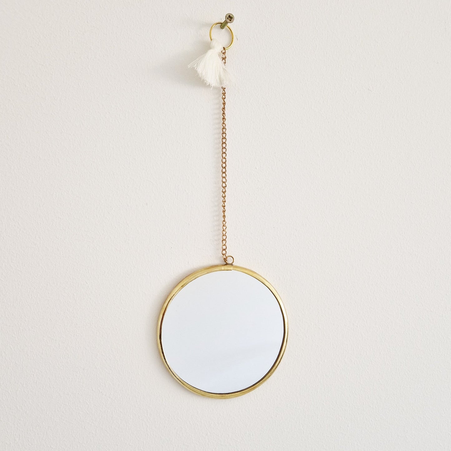 Set of 2 round brass mirrors on chain with tassel