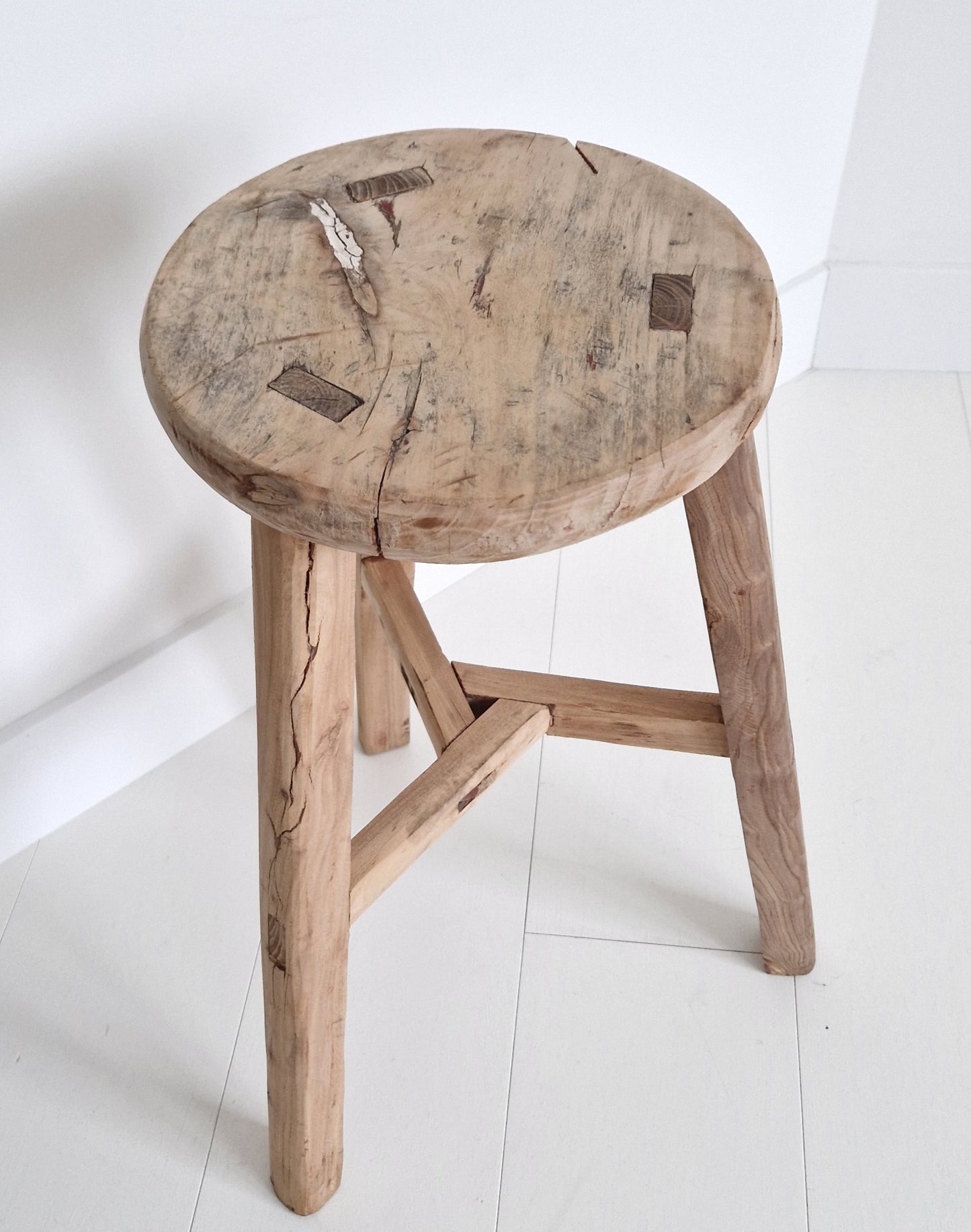 Old round wooden stool 