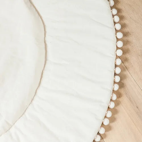 Boho quilted round floor mat with Pom Pom Trim