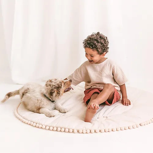 Boho quilted round floor mat with Pom Pom Trim