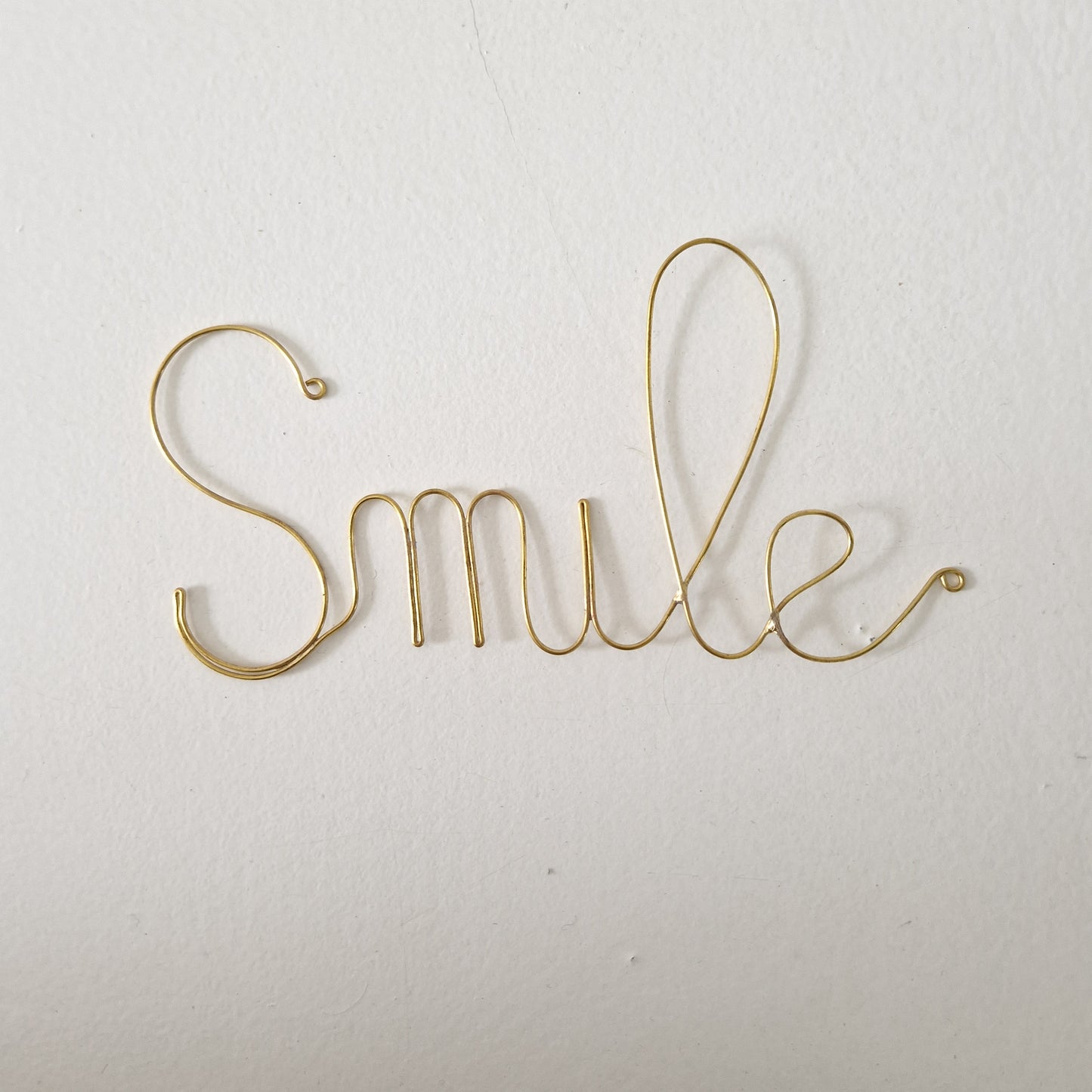 "Smile" Brass wire word