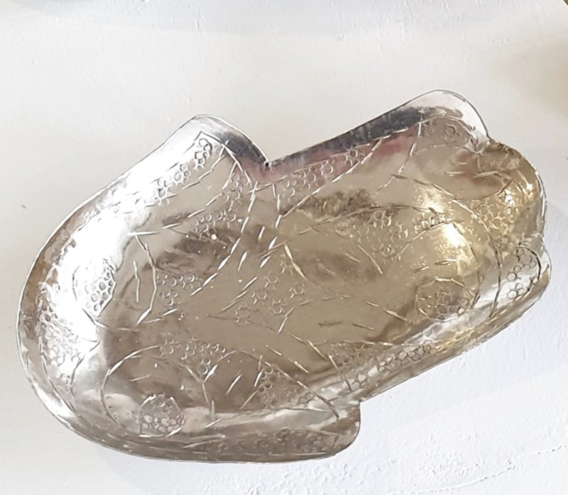Silver-colored hammered bowl hand